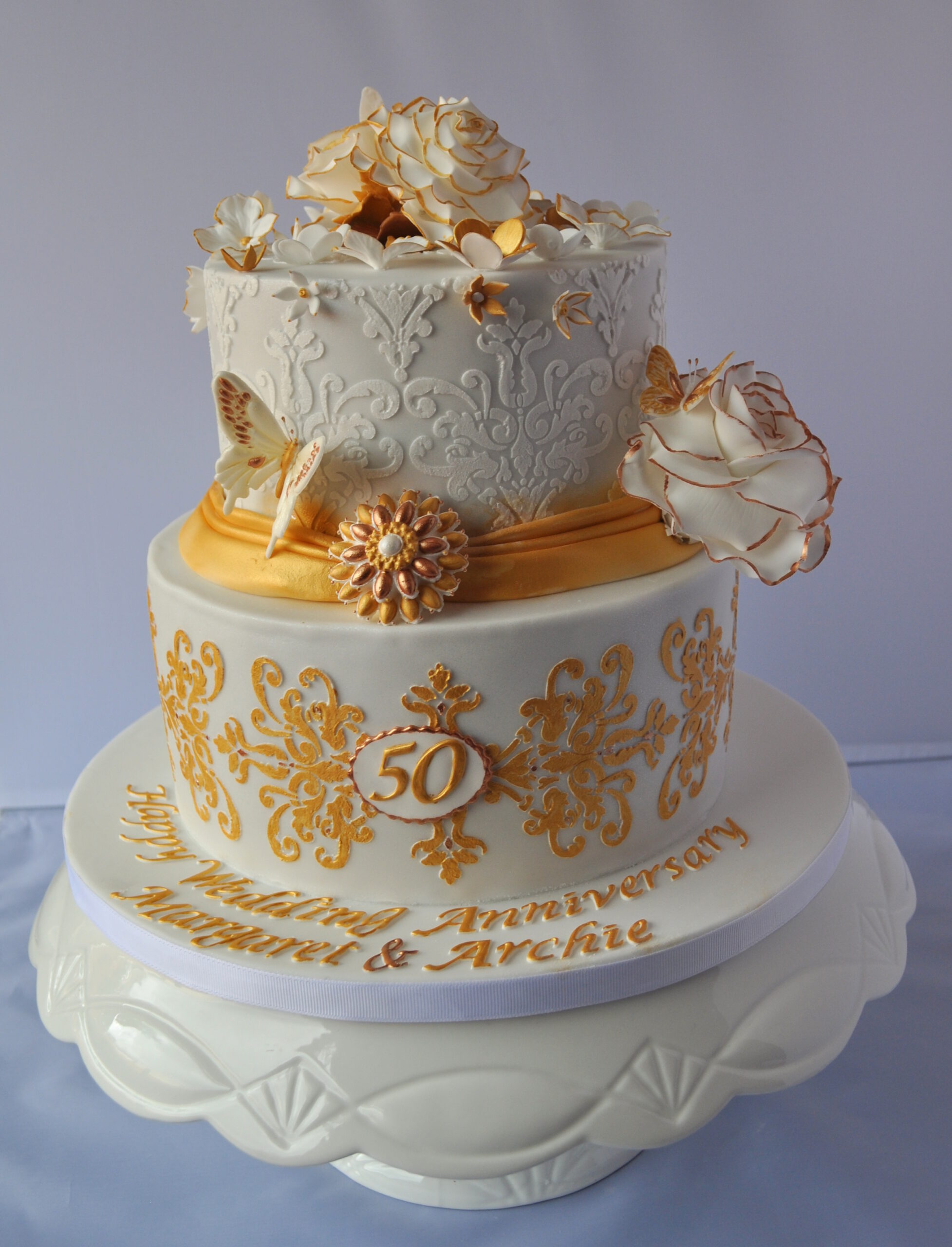 Tall wedding cake with sugar flowers